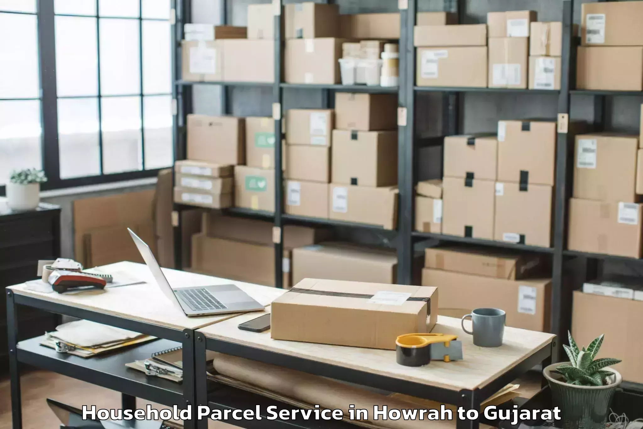 Easy Howrah to Kamdhenu University Gandhinaga Household Parcel Booking